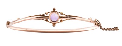 Lot 3 - EDWARDIAN 9CT GOLD AMETHYST & PEARL HINGED BANGLE