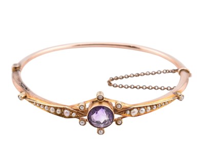 Lot 3 - EDWARDIAN 9CT GOLD AMETHYST & PEARL HINGED BANGLE