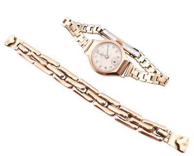 Lot 224 - A GOLD CASED AVIA WRISTWATCH WITH SPARE 9CT BRACELT STRAP