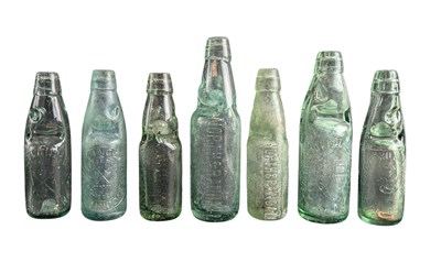 Lot 53 - SEVEN LATE 19TH & EARLY 20TH CENTURY GLASS ADVERTISING CARBONATED CODD BOTTLES
