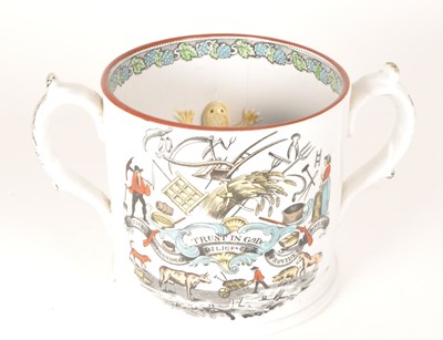 Lot 48 - STAFFORDSHIRE 19TH CENTURY TWIN HANDLED POTTERY MUG