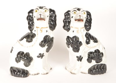 Lot 22 - PAIR OF 19TH CENTURY STAFFORDSHIRE FLATBACK DOGS