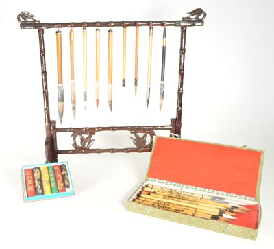 Lot 235 - CHINESE ART MATERIALS INCL HANGING BRUSH DISPLAY STAND, BRUSHES, INKS