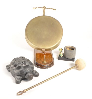Lot 234 - WALL HANGING BRASS DINNER GONG WITH STRIKER, TORTOISE AND DISH