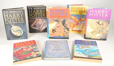 Lot 544 - HARRY POTTER BOOKS BY J K ROWLING EIGHT IN TOTAL SOME FIRST EDITIONS.