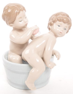 Lot 193 - TWO VINTAGE LLADRO PORCELAIN BATH TIME FIGURES