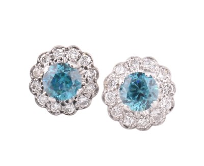 Lot 37 - PAIR OF WHITE GOLD ZIRCON & DIAMOND CLSUTER EARRINGS