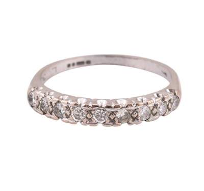 Lot 135 - HALLMARKED 18CT WHITE GOLD & DIAMOND HALF ETERNITY RING