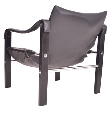 Lot 330 - MAUCRICE BURKE FOR ARKANA - SAFARI ARMCHAIR AND FOOTSTOOL