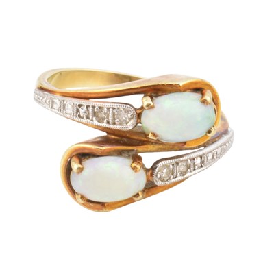 Lot 139 - GOLD OPAL & DIAMOND CROSSOVER RING