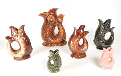 Lot 80 - COLLECTION OF SIX 20TH CENTURY CERAMIC FISH GLUG JUG VASES
