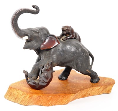 Lot 393 - MEIJI PERIOD LATE 19TH CENTURY BRONZE ELEPHANT / TIGER FIGURE