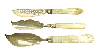 Lot 98 - THREE HALLMARKED SILVER WITH MOTHER OF PEARL HANDLED FISH KNIVES