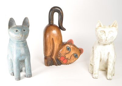 Lot 324 - THREE LATE 20TH CENTURY CARVED WOODEN CAT FIGURES / DOORSTOPS