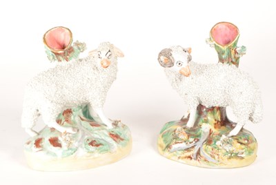 Lot 129 - PAIR OF STAFFORDSHIRE 19TH CENTURY PORCELAIN SHEEP SPILL VASES