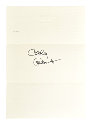 Lot 33 - ACTORS - CARY GRANT (1904-1986) - AUTOGRAPH ON FABERGE PAPER