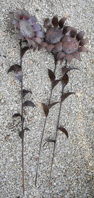 Lot 571 - THREE DECORATIVE CAST METAL GARDEN SUNFLOWERS