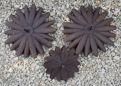 Lot 573 - THREE VINTAGE GARDEN SCULPTURES OF FLOWER HEADS