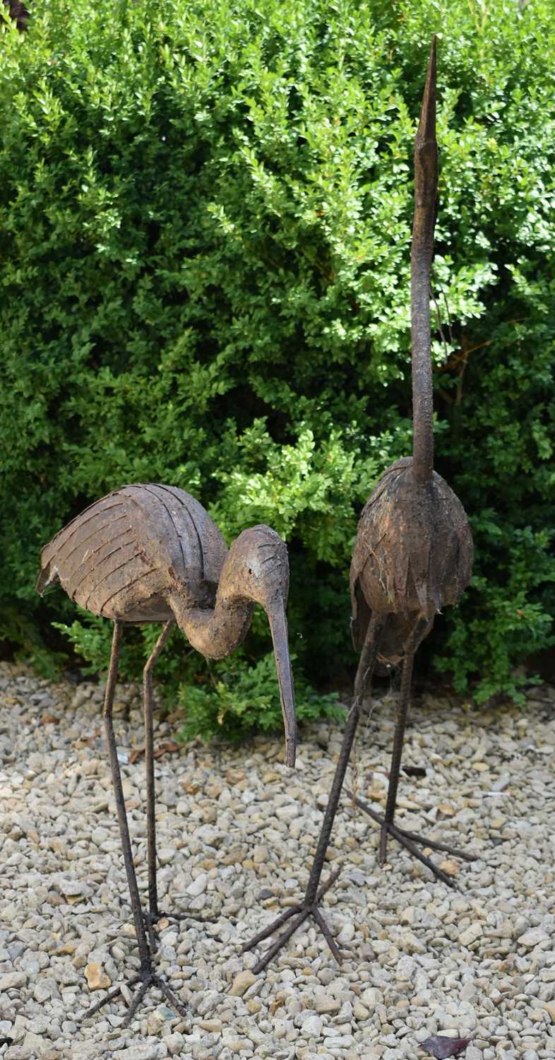 Lot 590 - TWO VINTAGE CAST METAL GARDEN HERON / STORK SCULPTURES