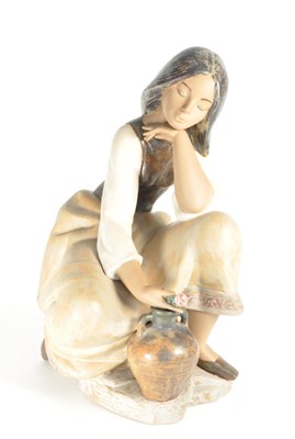 Lot 142 - LLADRO - NAO - LATE 20TH CENTURY PORCELAIN WATER CARRIER FIGURE 3525