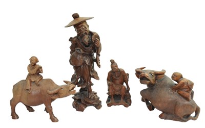 Lot 151 - FOUR EARLY 20TH CENTURY CHINESE WOOD CARVED FIGURES 民国 实木人物雕刻一组