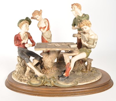 Lot 161 - CAPODIMONTE - 20TH CENTURY TEPIZZI CARD PLAYER GROUP FIGURE