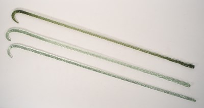 Lot 430 - THREE 19TH CENTURY NAILSEA TWISTED GLASS WALKING STICKS