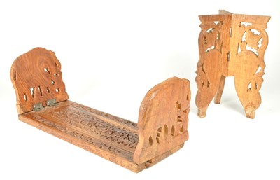 Lot 201 - 20TH CENTURY WOODEN CARVED INDIAN BOOKSLIDE AND TABLE LEGS