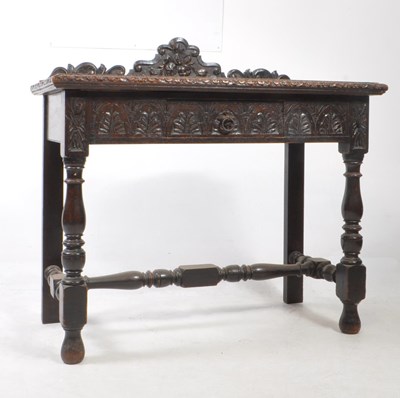 Lot 684 - REPRODUCTION JACOBEAN STYLE CARVED OAK HALL / CONSOLE TABLE