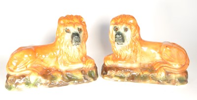 Lot 17 - PAIR OF 19TH CENTURY STAFFORDSHIRE LIONS