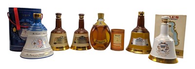 Lot 184 - SIX BELL'S OLD SCOTCH WHISKY COMMEMORATIVE DECANTER T/W ANOTHER