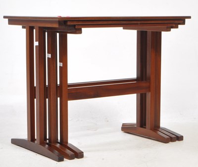 Lot 594 - DANISH MID CENTURY NEST OF THREE TABLES
