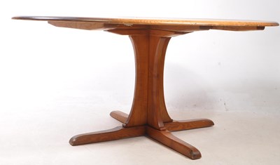Lot 691 - ERCOL FURNITURE - LATE 20TH CENTURY ELM DINING TABLE