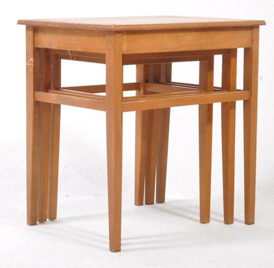 Lot 552 - BRITISH MODERN DESIGN - MID CENTURY TEAK NEST OF TABLES