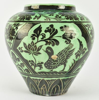 Lot 146 - NORTHERN SONG GREEN GLAZED CIZHOU 'RABBIT' SGRAFFITO JAR 磁州绿釉