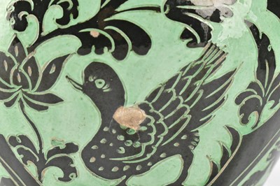 Lot 146 - NORTHERN SONG GREEN GLAZED CIZHOU 'RABBIT' SGRAFFITO JAR 磁州绿釉