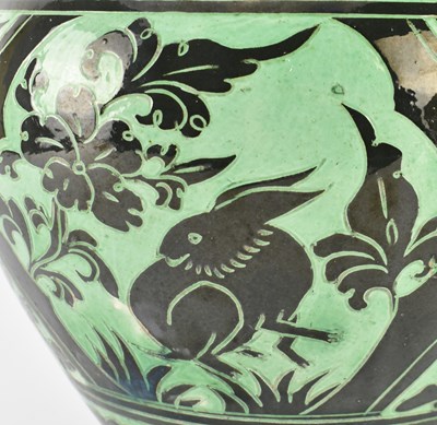 Lot 146 - NORTHERN SONG GREEN GLAZED CIZHOU 'RABBIT' SGRAFFITO JAR 磁州绿釉