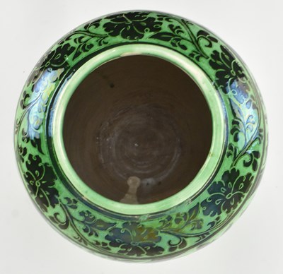 Lot 146 - NORTHERN SONG GREEN GLAZED CIZHOU 'RABBIT' SGRAFFITO JAR 磁州绿釉