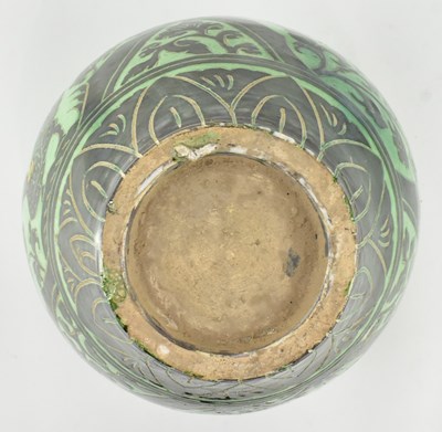 Lot 146 - NORTHERN SONG GREEN GLAZED CIZHOU 'RABBIT' SGRAFFITO JAR 磁州绿釉