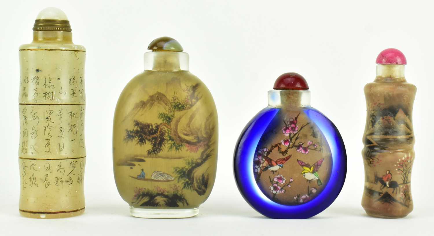 Lot 128 - COLLECTION OF FOUR GLASS SNUFF BOTTLES 四件二十世纪玻璃鼻烟壶