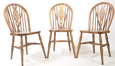 Lot 1026 - THREE 20TH CENTURY COUNTRY WHEELBACK DINING CHAIRS