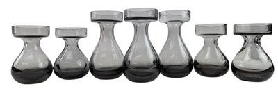 Lot 27 - THROWER FOR WEDGWOOD - 'GEORGE' - SEVEN CANDLESTICKS