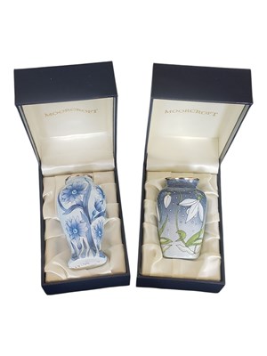 Lot 86 - MOORCROFT - TWO LATE 20TH / 21ST CENTURY ENAMEL MINIATURE VASES
