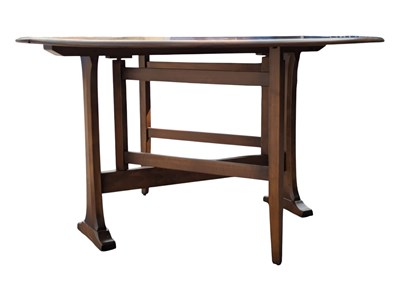 Lot 835 - ERCOL FURNITURE - 20TH CENTURY BEECH & ELM DROP LEAF DINING TABLE