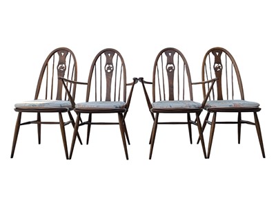 Lot 832 - ERCOL FURNITURE - FOUR SWAN BACK WINDSOR DINING CHAIRS