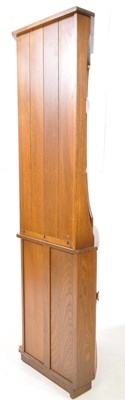 Lot 802 - ERCOL FURNITURE - 20TH CENTURY BEECH & ELM WOOD CORNER CUPBOARD