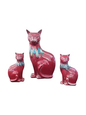 Lot 100 - POOLE POTTERY - THREE VINTAGE 1960S FLAMBE DELPHIS CAT FIGURES