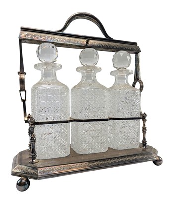 Lot 7 - LATE 19TH / EARLY 20TH CENTURY CUT GLASS AND SILVER-PLATED TANTALUS