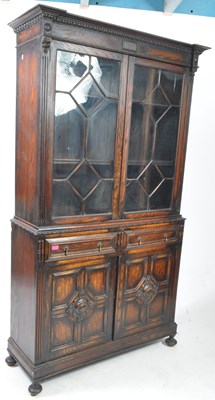 Lot 975 - 1920S OAK JACOBEAN REVIVAL LIBRARY BOOKCASE