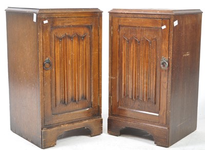 Lot 968 - PAIR OF JACOBEAN REVIVAL OAK LINEN FOLD BEDSIDE CABINETS